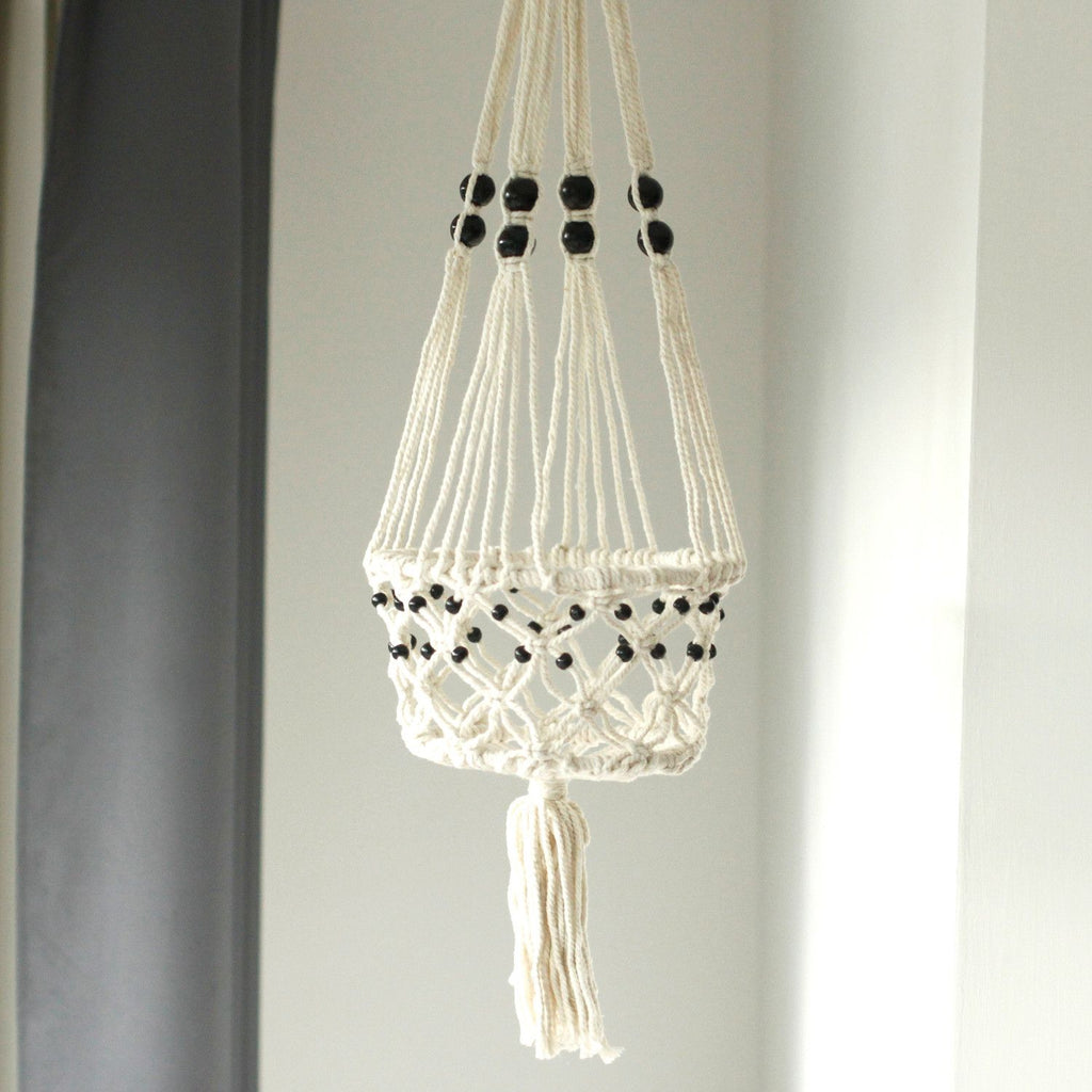 Suspension artisanale en coton tressé pour pot de plante