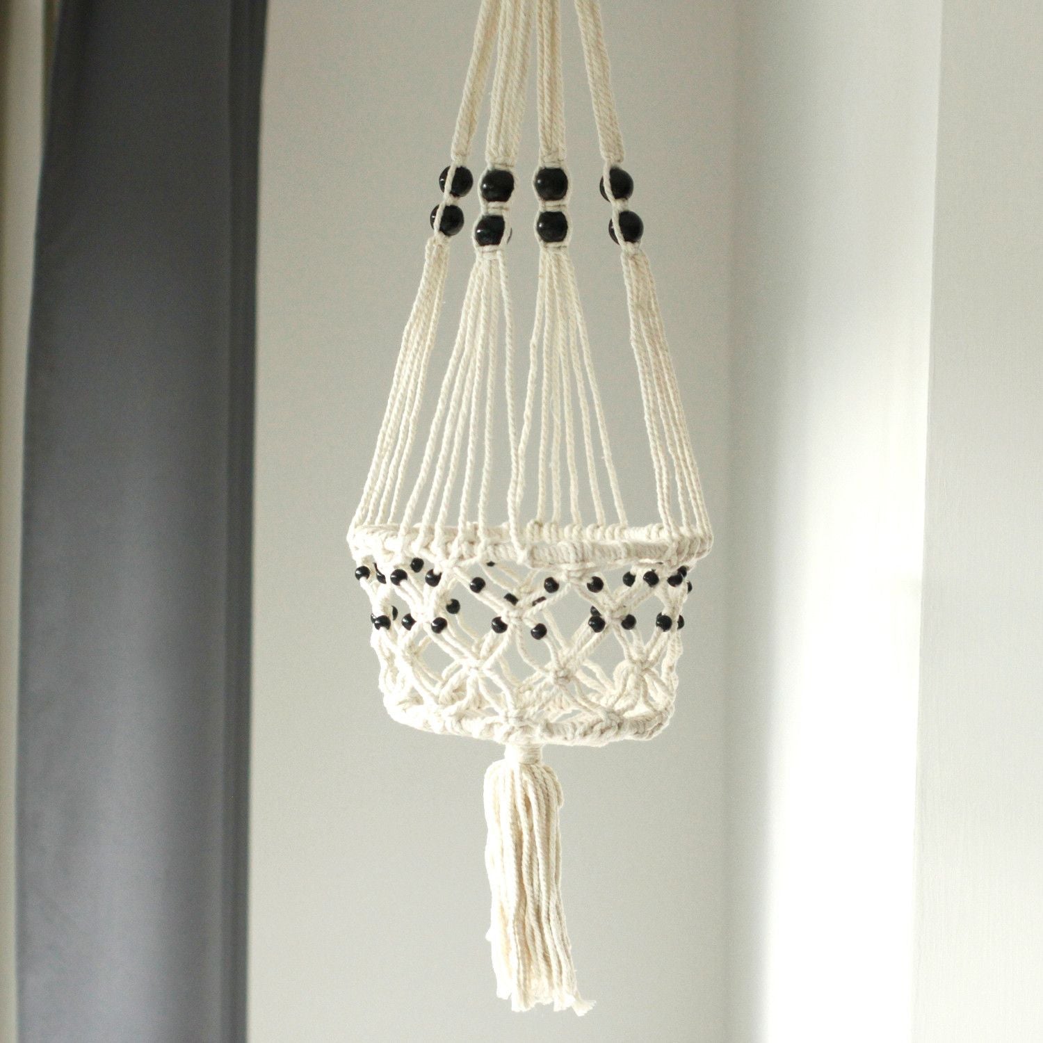 Suspension artisanale en coton tressé pour pot de plante